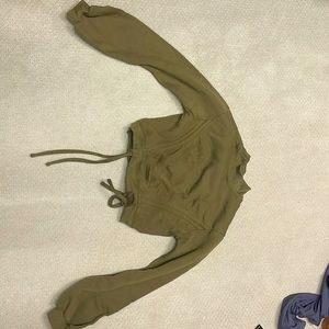 Brownish green mock neck cropped with balloon sleeves athletic top